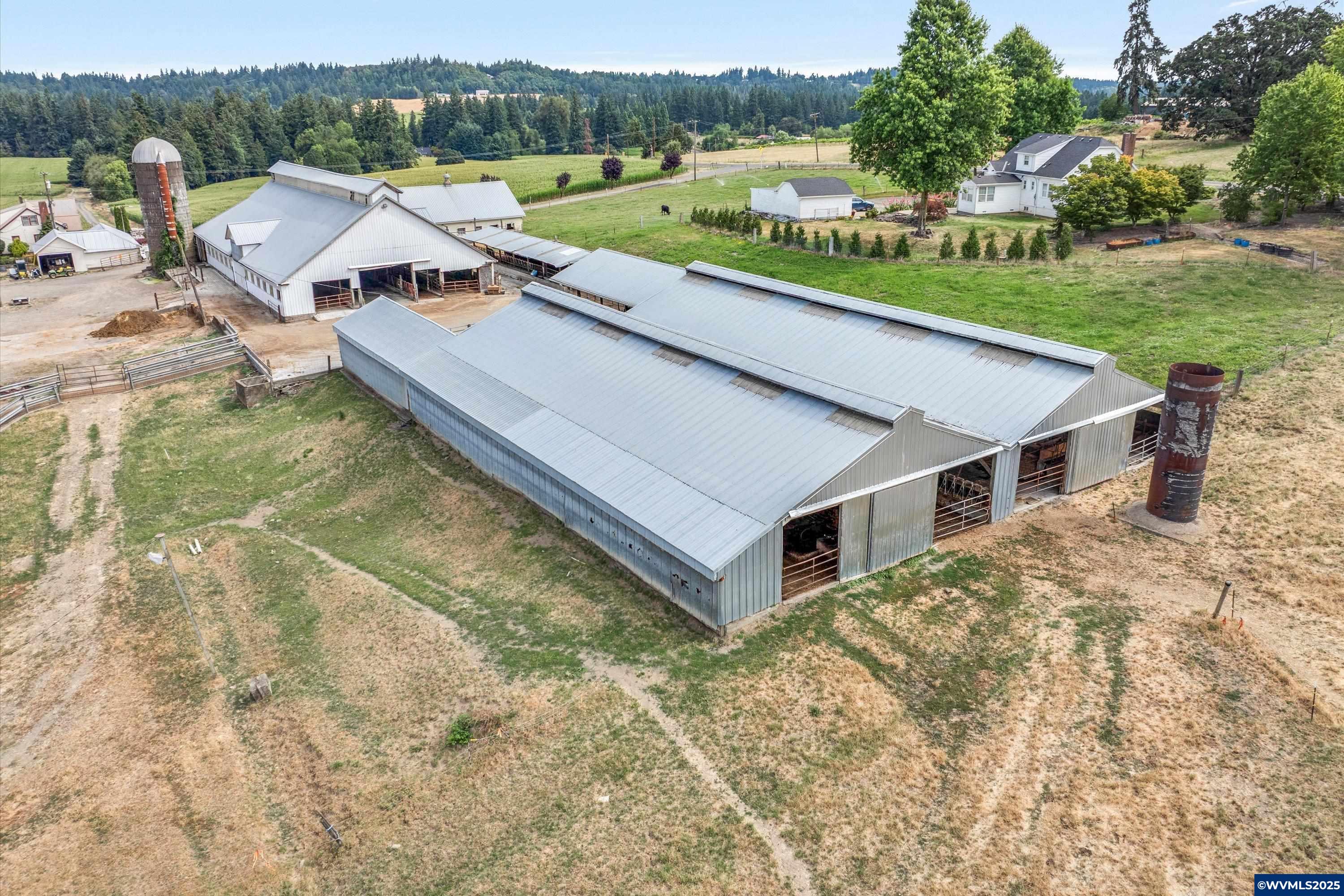 21303 South Central Point Road Canby, OR 97013 - Photo 24 of 50 a view of a house with pool and a yard