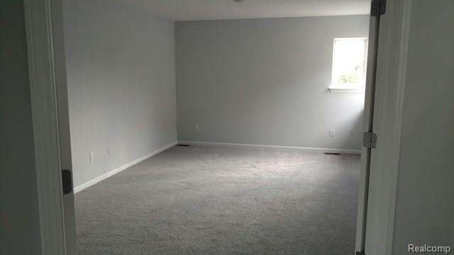 425 Lilly View Court Howell, MI 48843 - Photo 7 of 11 MasterBedroom2-425LillyView.jpg