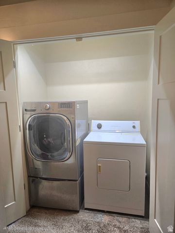 601 West 150 North, Unit 25 Springville, UT 84663 - Photo 22 of 29 Laundry closet featuring bi-fold doors and carpeted flooring