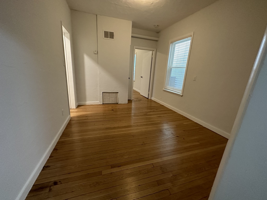 303 Hancock Street, Unit 2 Boston, MA 02125 - Photo 3 of 8 a view of an entryway