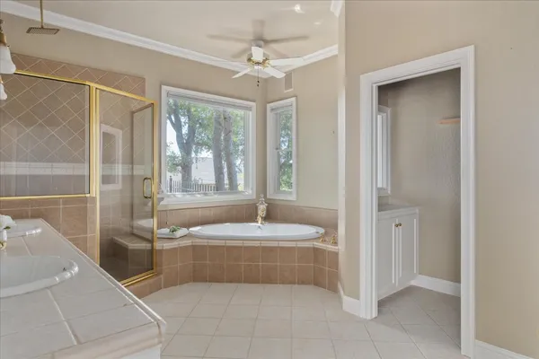 a bathroom with a sink a vanity and a mirror