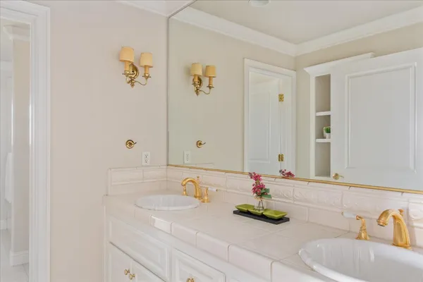 a bathroom with a shower and a mirror