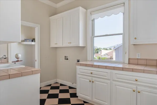 a view of a livingroom with furniture and a fireplace