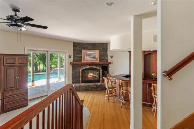 a view of a livingroom with furniture and a fireplace