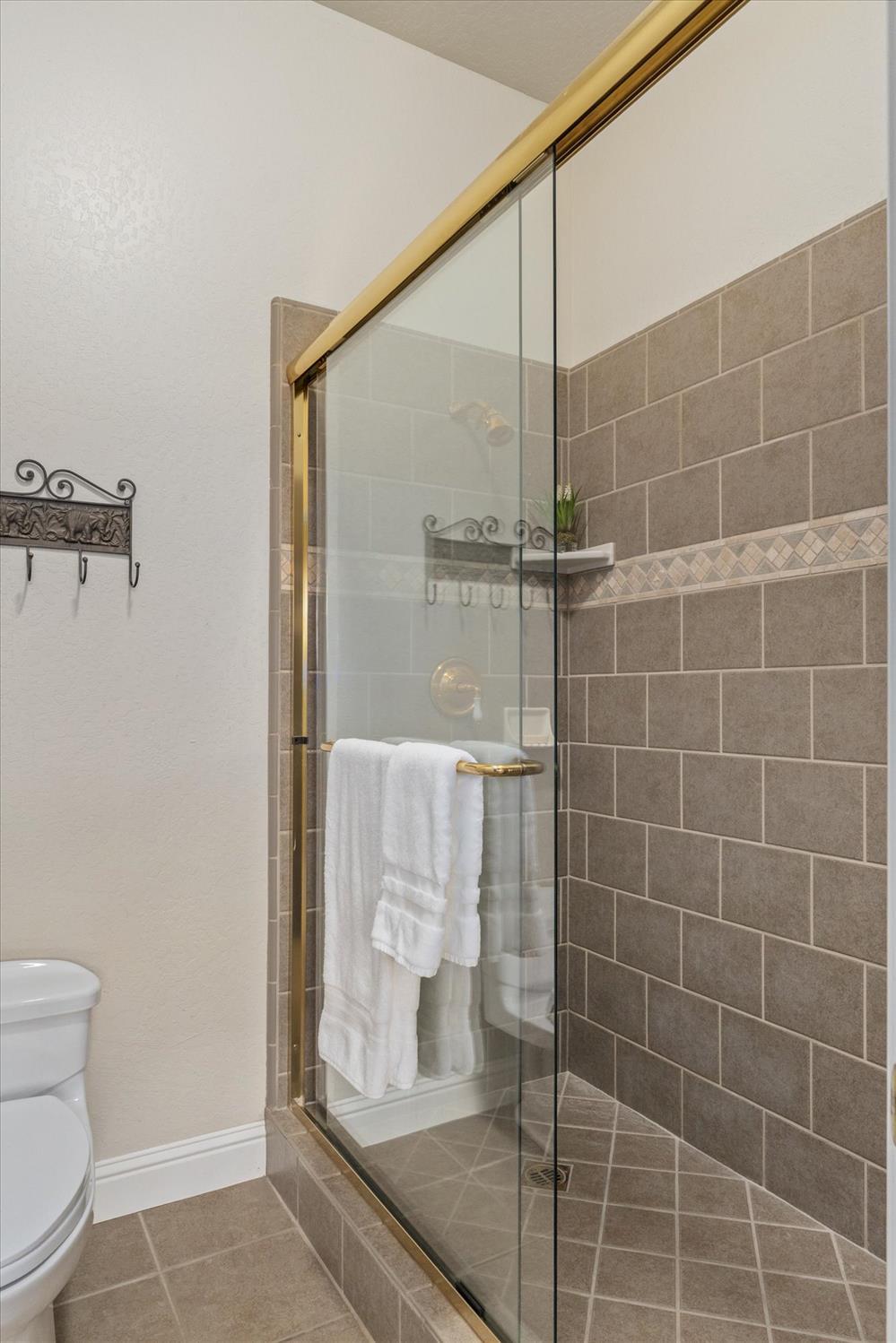 643 Miwuk Way Angels Camp, CA 95222 - Photo 42 of 55 a bathroom with a shower