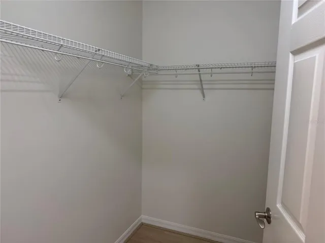 a view of a room with racks on the wall
