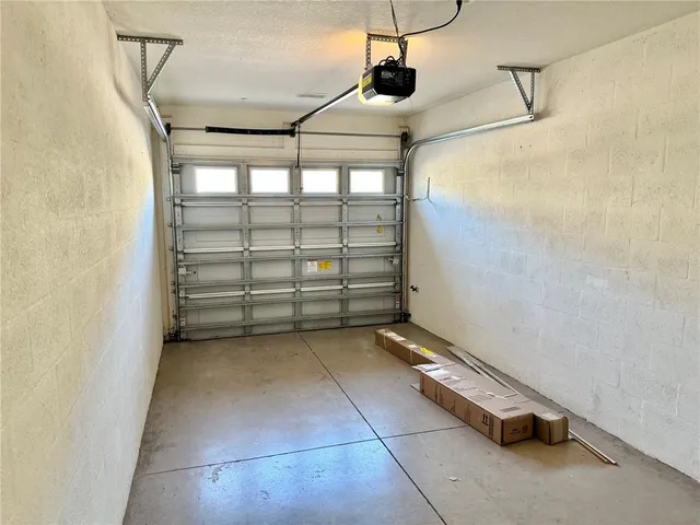 a view of storage and utility room with stairs