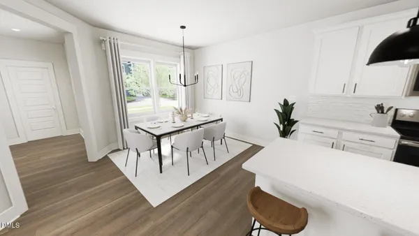 a living room with furniture a table and wooden floor