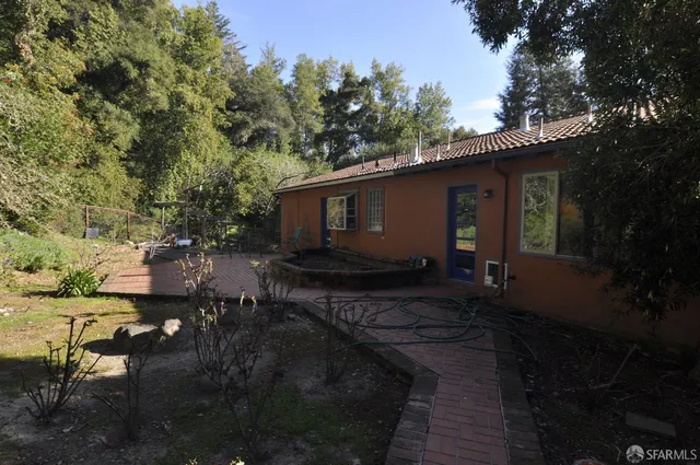 a view of outdoor seating and green space