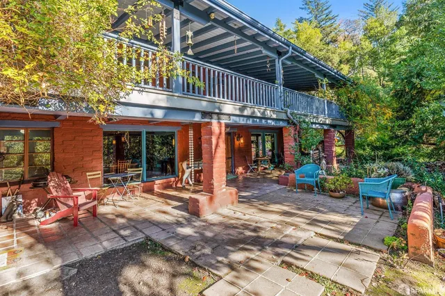 a view of a cafe with sitting area