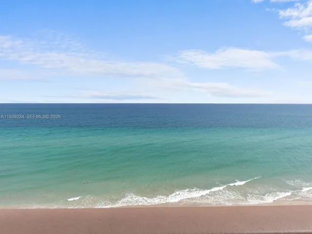 a view of yard with ocean view
