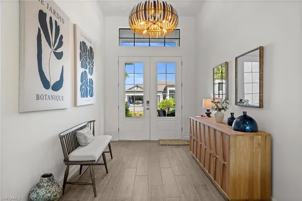 a view of a room that has a bench and toys