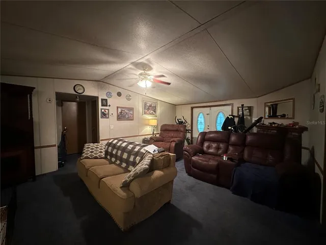 a view of entryway with livingroom