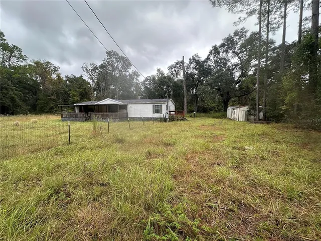 a view of outdoor space and yard