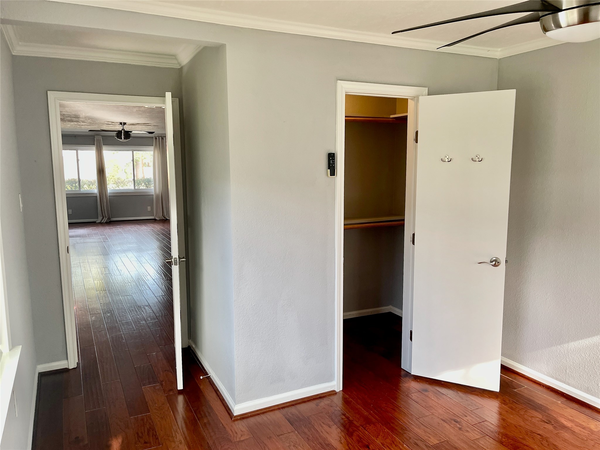 6674 Sylvan Road Houston, TX 77023 - Photo 14 of 17 an empty room with wooden floor and closet