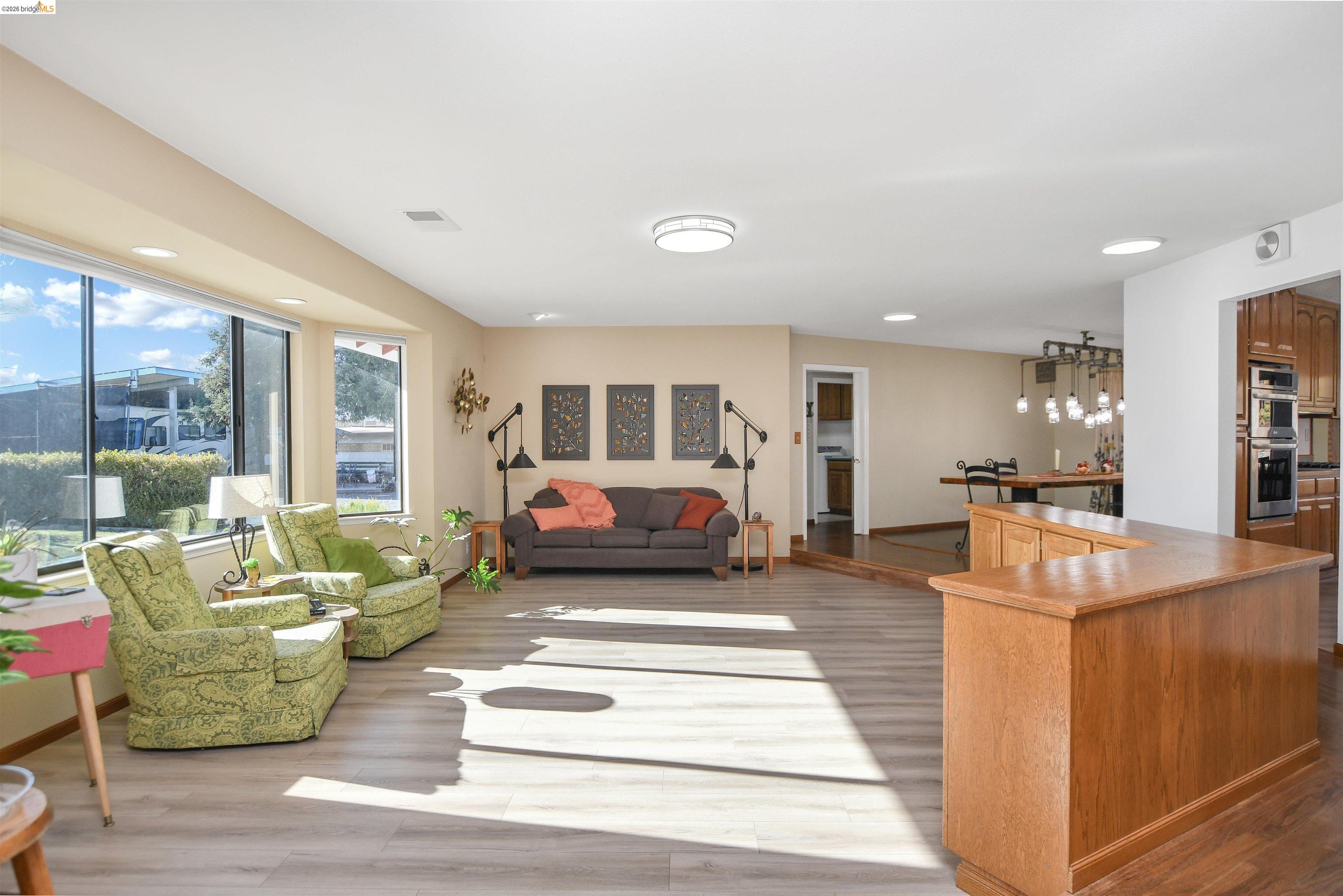 23751 Marsh Creek Road Brentwood, CA 94513 - Photo 13 of 49 a living room with furniture and a large window
