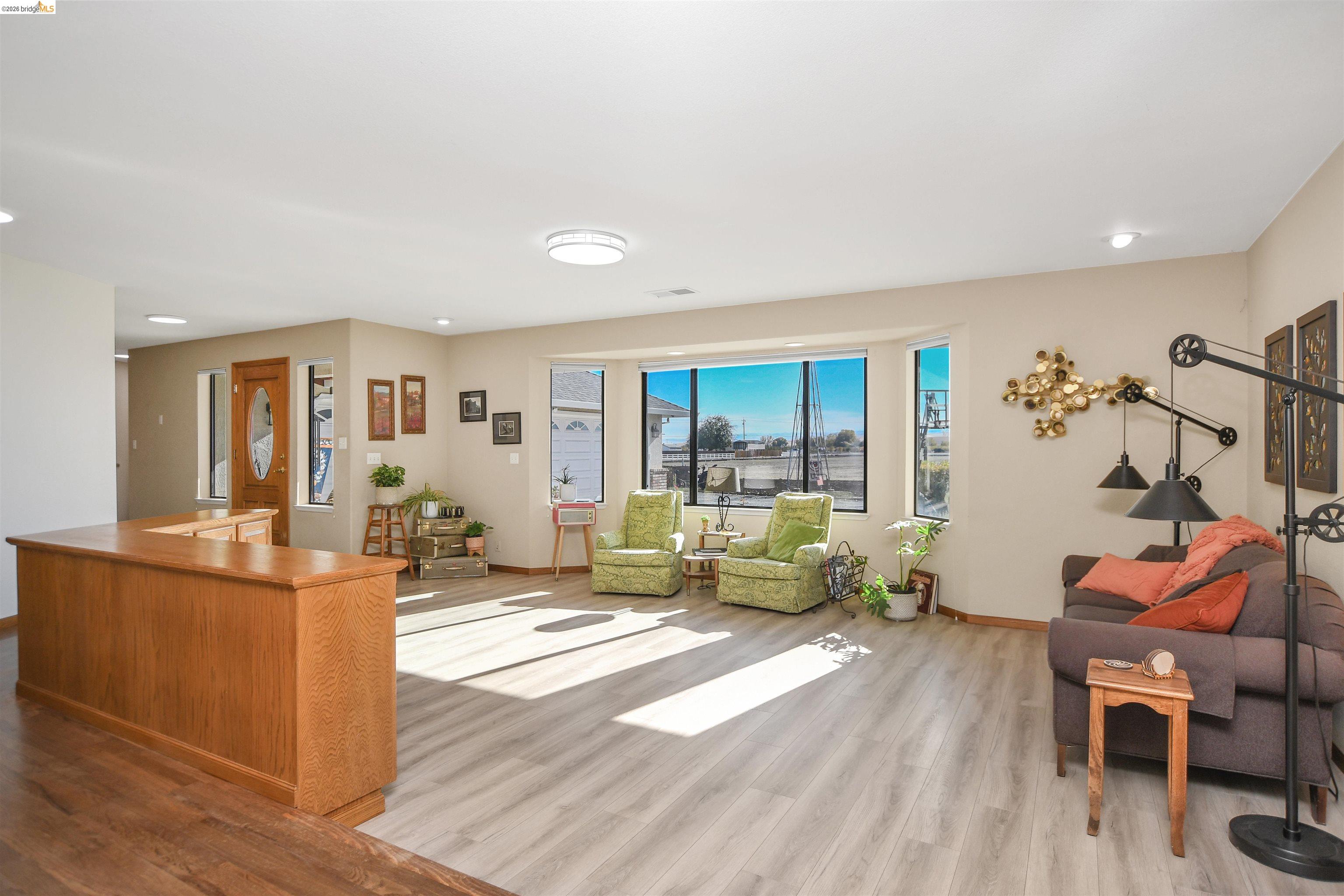 23751 Marsh Creek Road Brentwood, CA 94513 - Photo 14 of 49 a living room with furniture and wooden floor