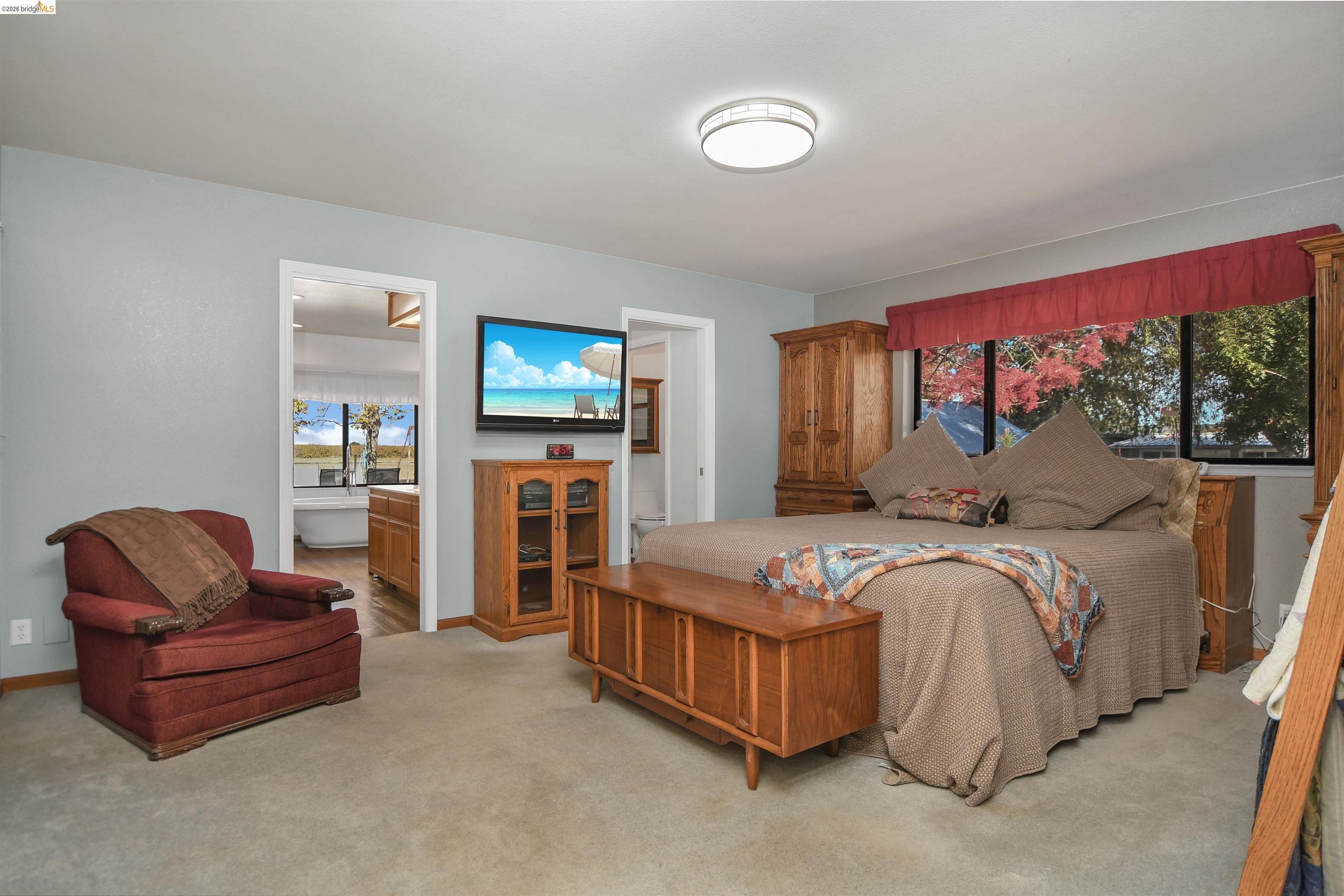 23751 Marsh Creek Road Brentwood, CA 94513 - Photo 26 of 49 a bedroom with bed couch and window