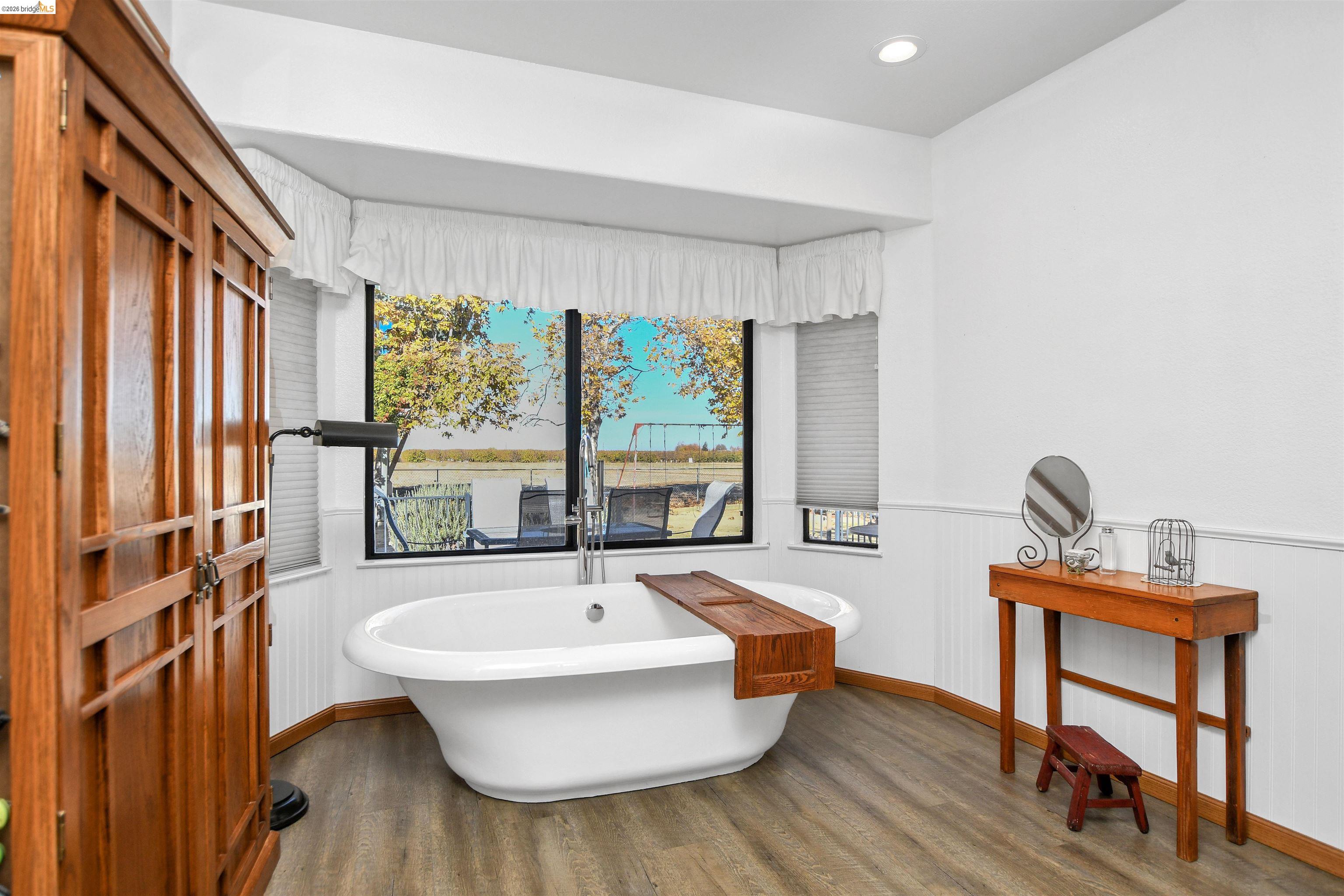23751 Marsh Creek Road Brentwood, CA 94513 - Photo 29 of 49 a room with table chairs and a large window