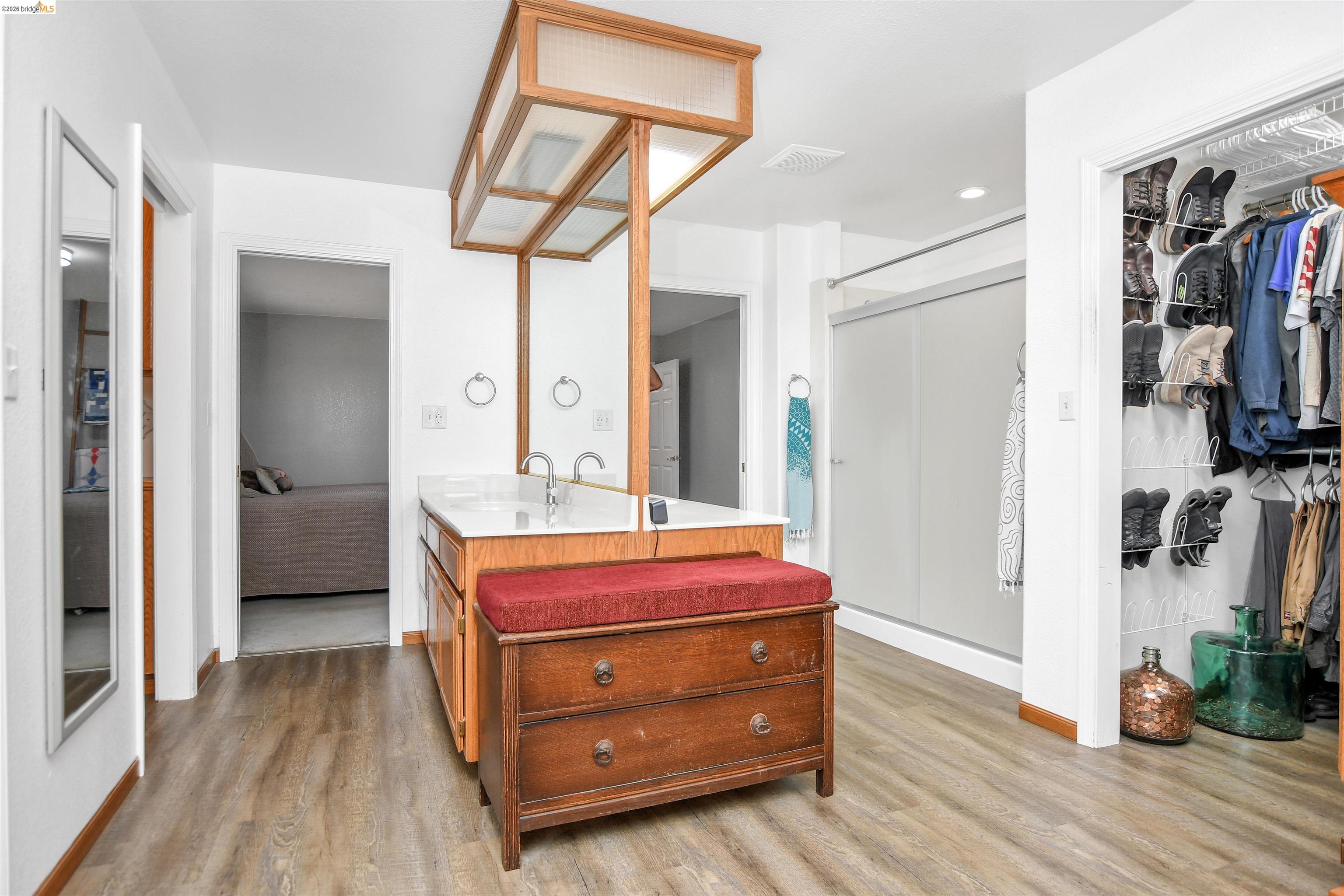 23751 Marsh Creek Road Brentwood, CA 94513 - Photo 30 of 49 a room with a bed and a mirror