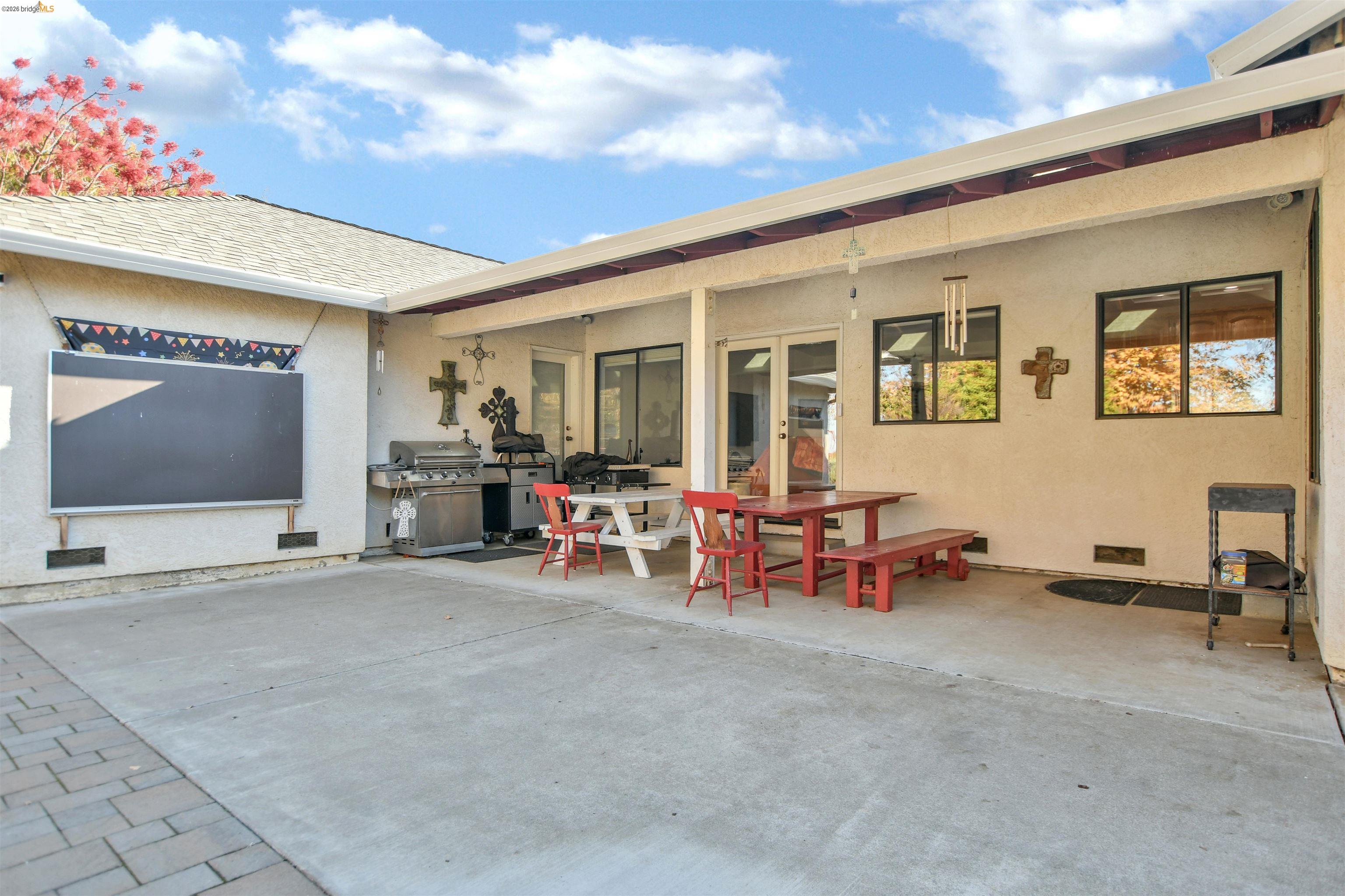 23751 Marsh Creek Road Brentwood, CA 94513 - Photo 32 of 49 a view of a livingroom with furniture and a garage