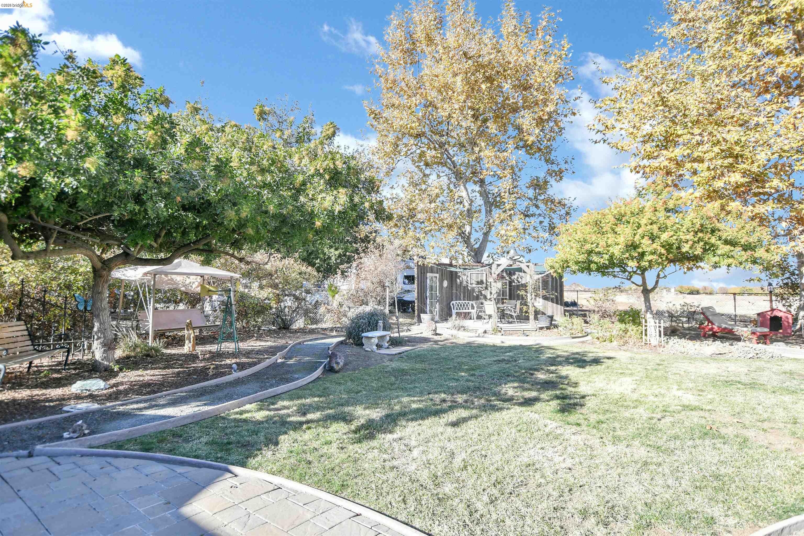 23751 Marsh Creek Road Brentwood, CA 94513 - Photo 39 of 49 a view of yard with tree in the background
