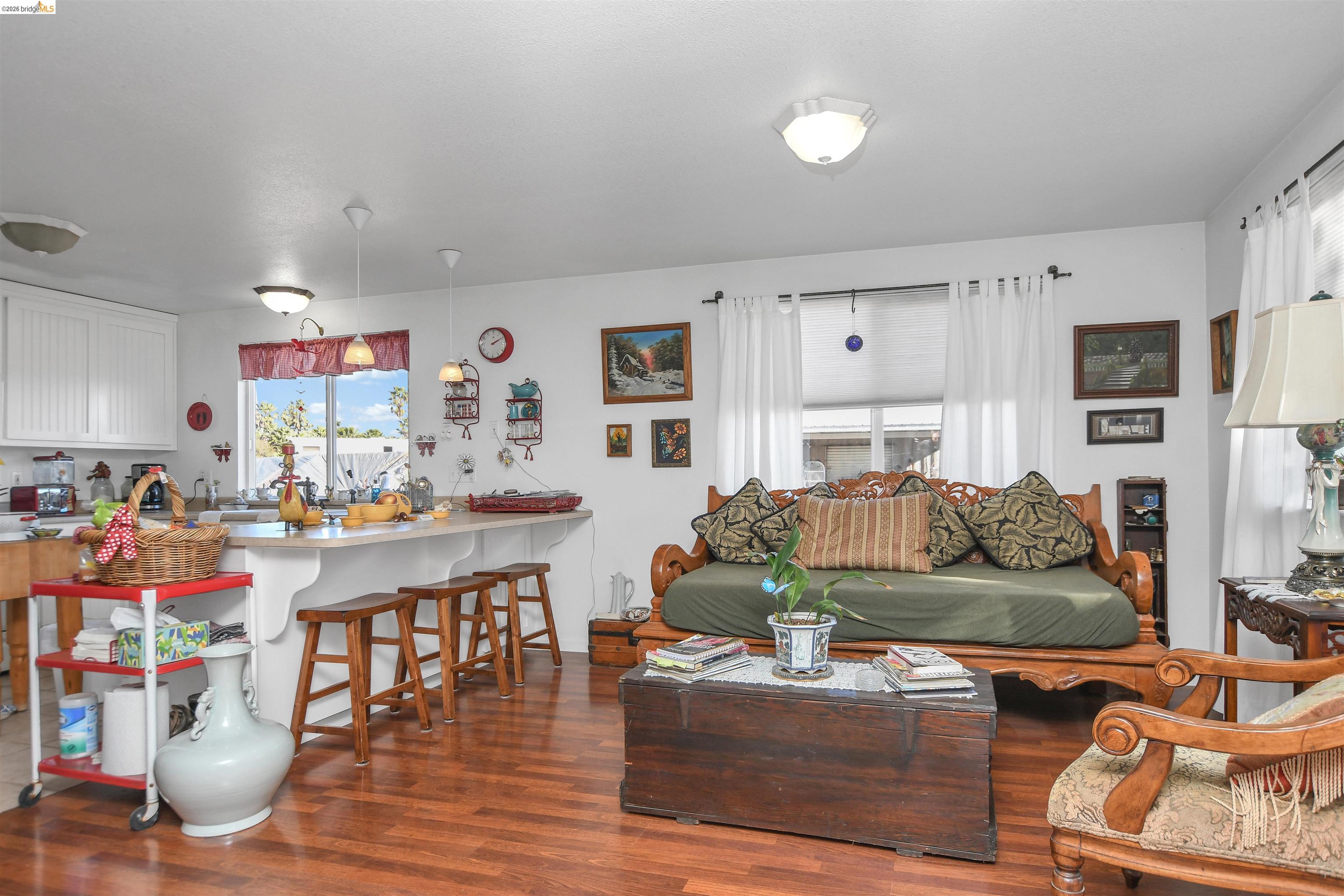 23751 Marsh Creek Road Brentwood, CA 94513 - Photo 41 of 49 a living room with furniture and a flat screen tv