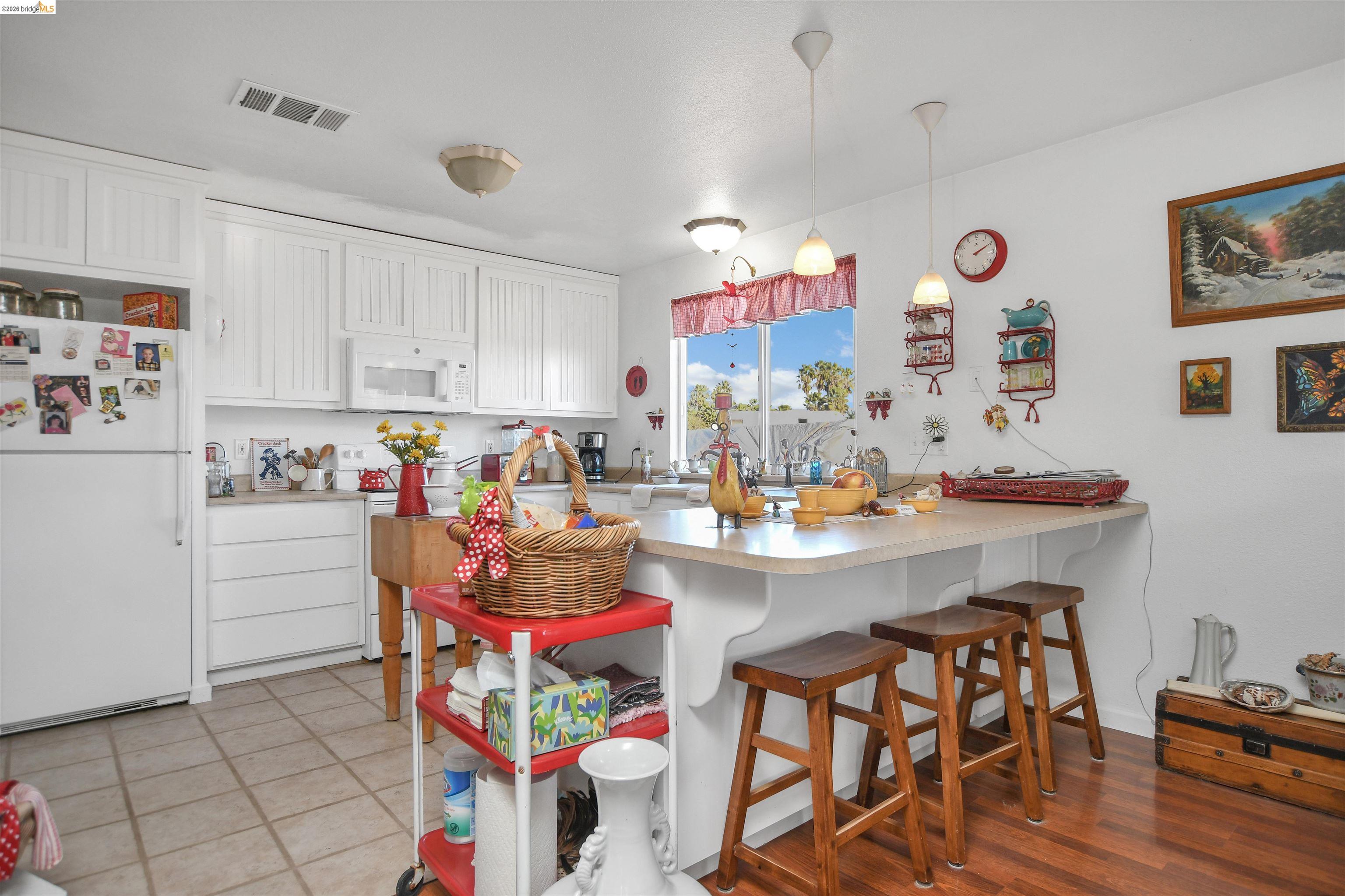 23751 Marsh Creek Road Brentwood, CA 94513 - Photo 42 of 49 a open kitchen with a sink and cabinets