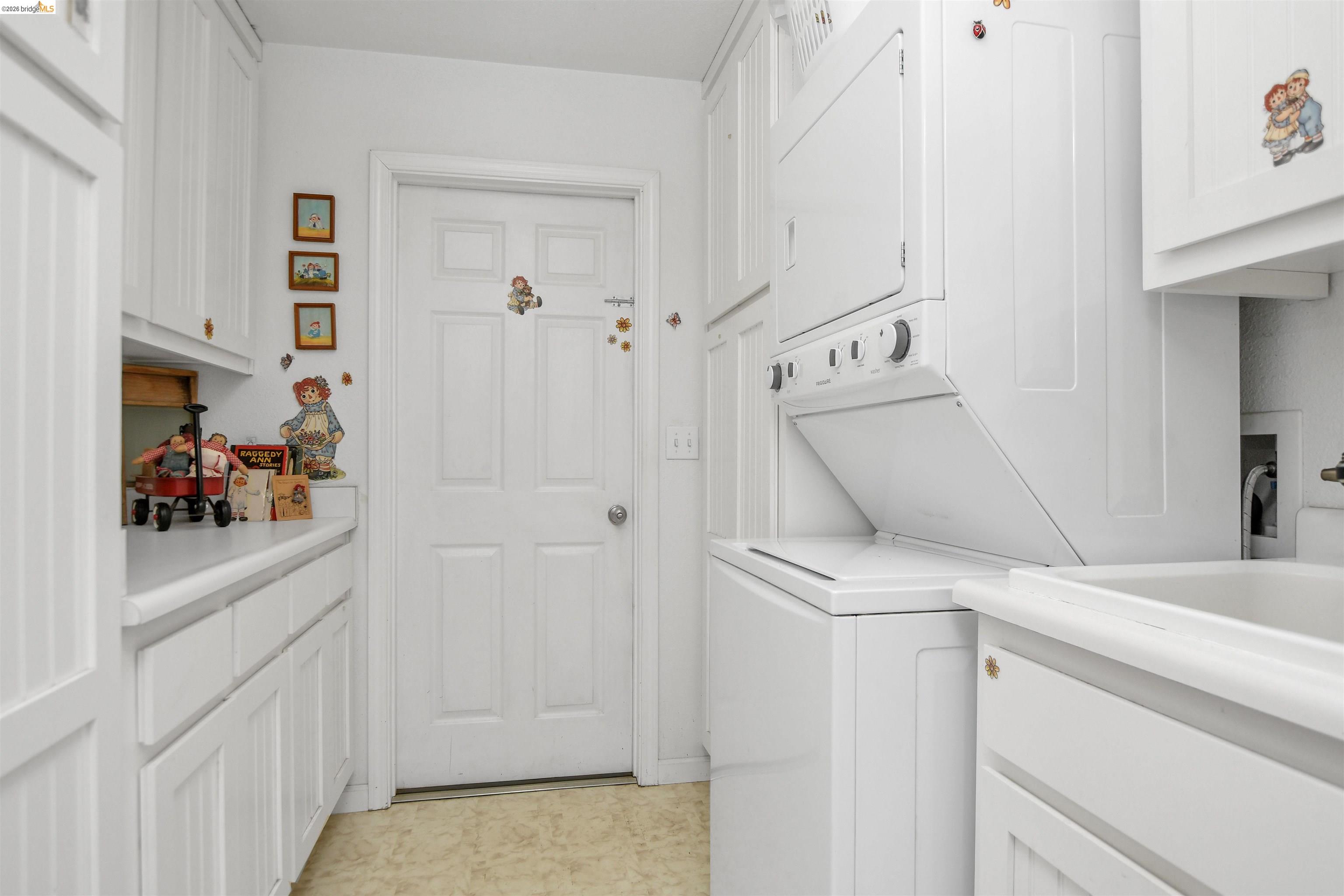 23751 Marsh Creek Road Brentwood, CA 94513 - Photo 45 of 49 a view of a hallway with closet and utility room