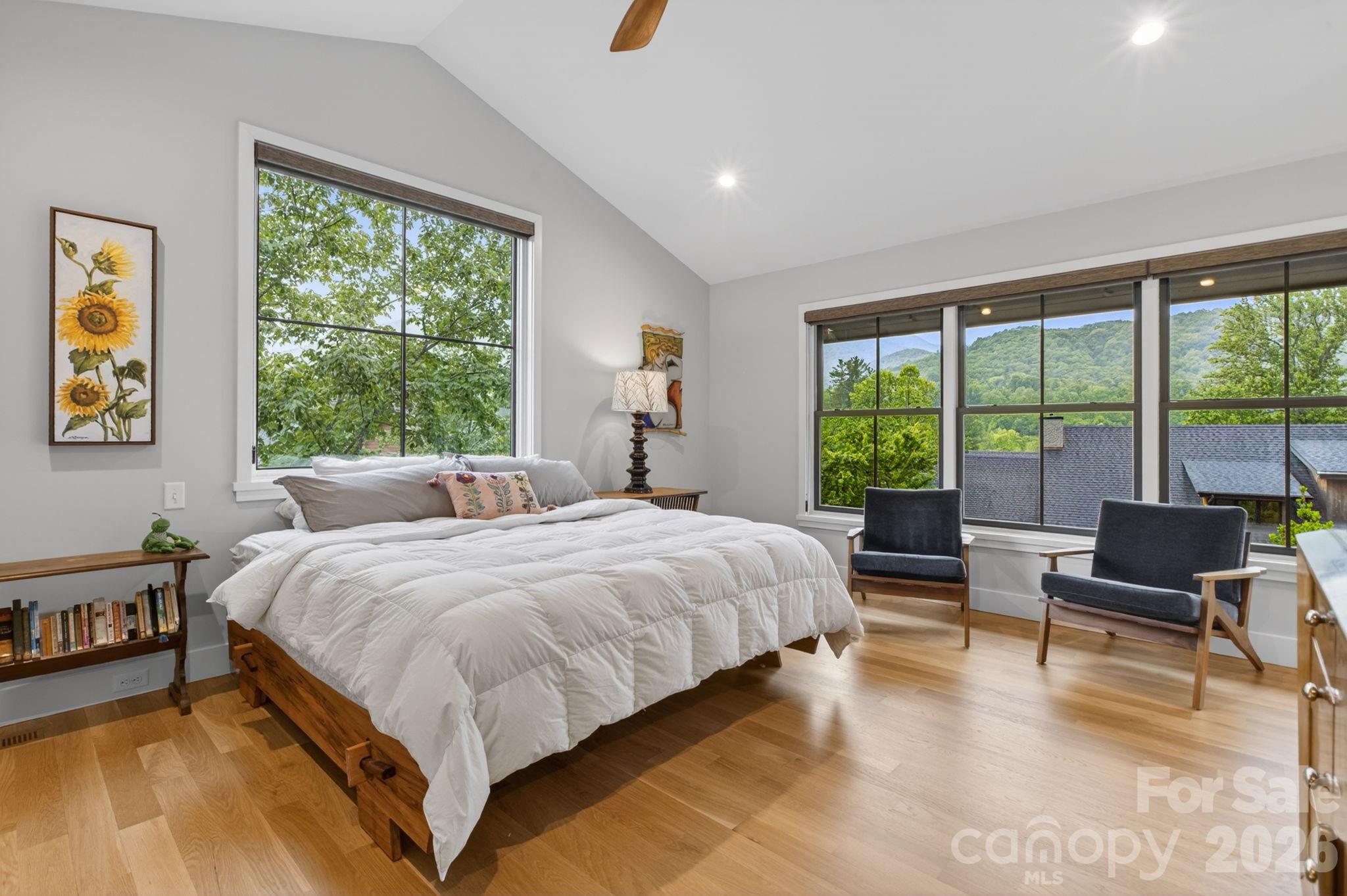 18 Wordsworth Road Black Mountain, NC 28711 - Photo 15 of 23 a large bedroom with a bed and large windows