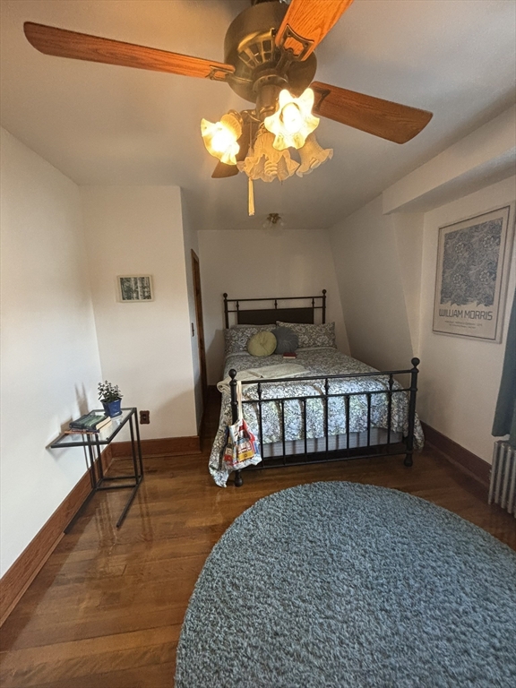 460 Burncoat Street, Unit B Worcester, MA 01606 - Photo 12 of 19 a bedroom with furniture and a mirror