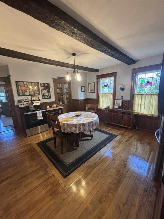 460 Burncoat Street, Unit B Worcester, MA 01606 - Photo 4 of 19 a living room with a couch and a flat screen tv