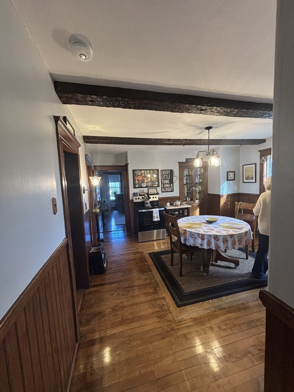 460 Burncoat Street, Unit B Worcester, MA 01606 - Photo 5 of 19 a living room with furniture and a flat screen tv