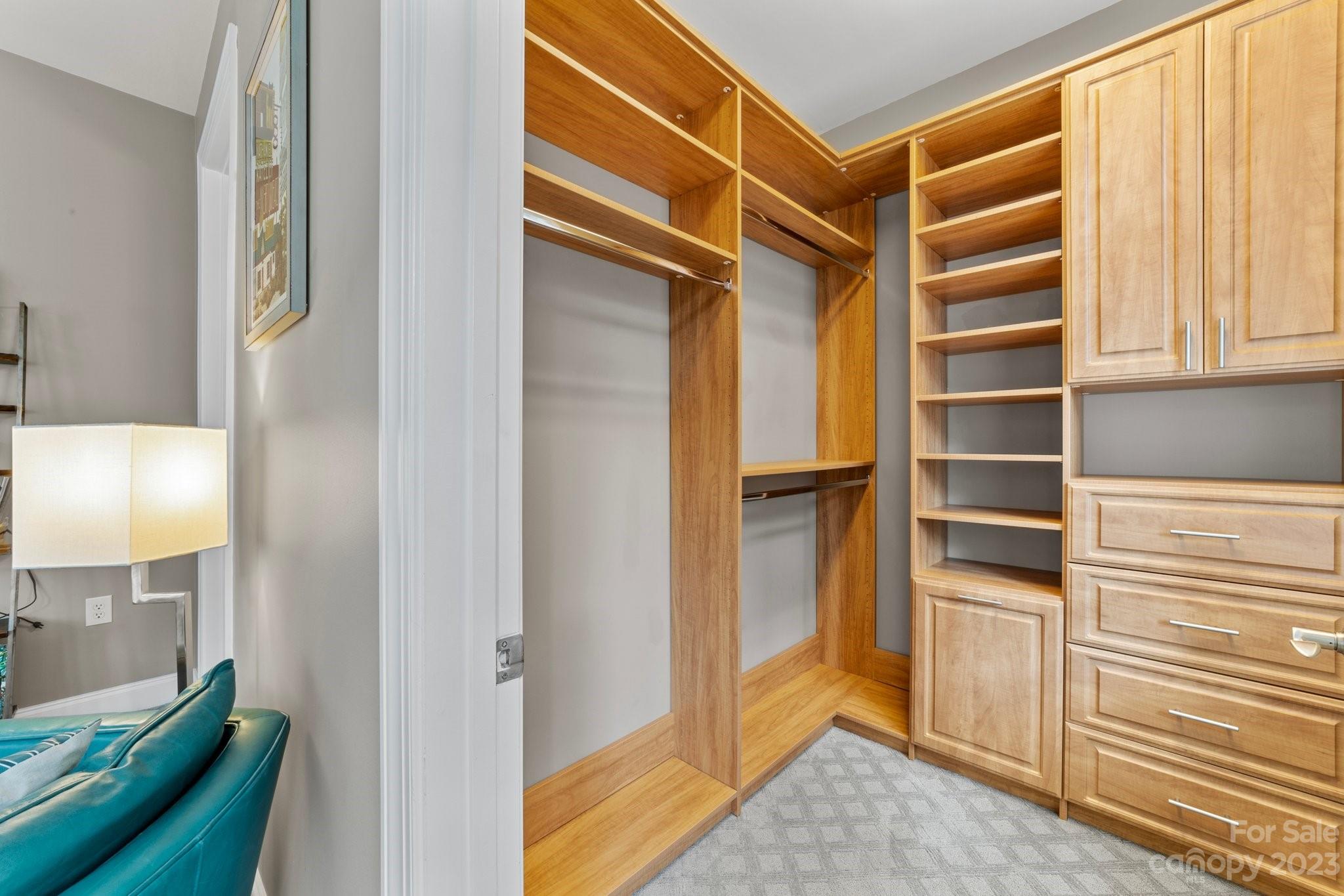 230 South Tryon Street, Unit 906 Charlotte, NC 28202 - Photo 23 of 27 a view of walk in closet with empty racks