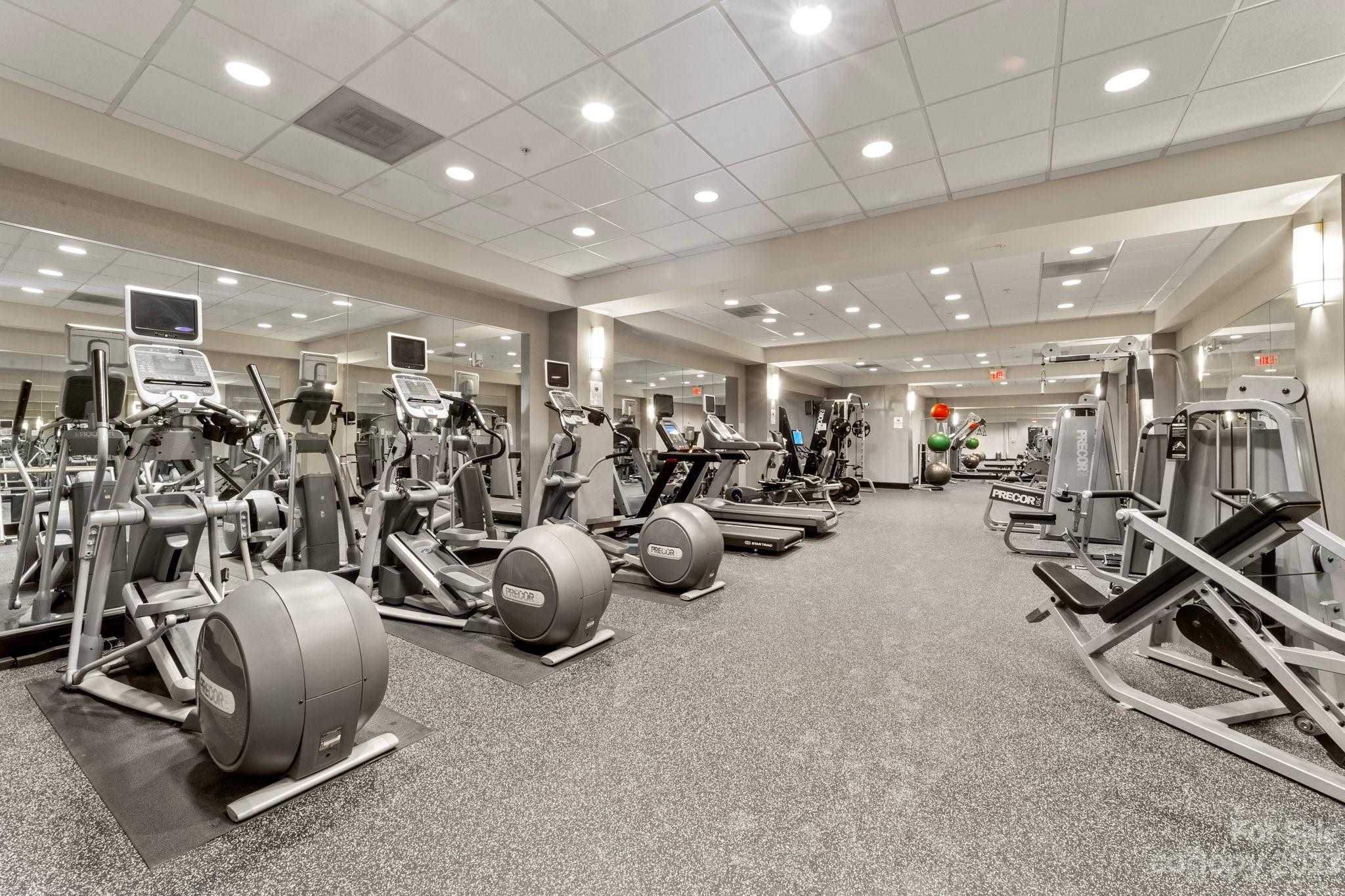 230 South Tryon Street, Unit 906 Charlotte, NC 28202 - Photo 26 of 27 a view of a room with gym equipment