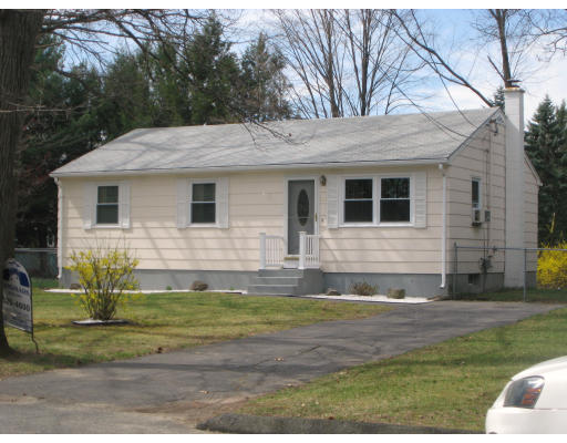 150 Donbray Road Springfield, MA 01119 - Photo 1 of 1 a front view of a house with a yard