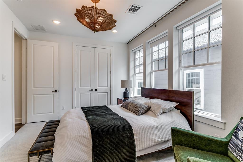 645 North Tyler Street, Unit 106 Dallas, TX 75208 - Photo 22 of 25 Bedroom with carpet flooring and a closet