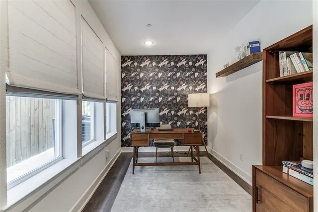 a balcony with chairs and with outdoor views