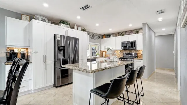 $865,000 | 8540 Northwest 182nd Street, Hialeah, FL 33015