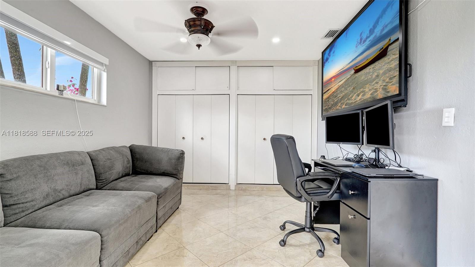 8540 Northwest 182nd Street Hialeah, FL 33015 - Photo 25 of 63 a living room with furniture