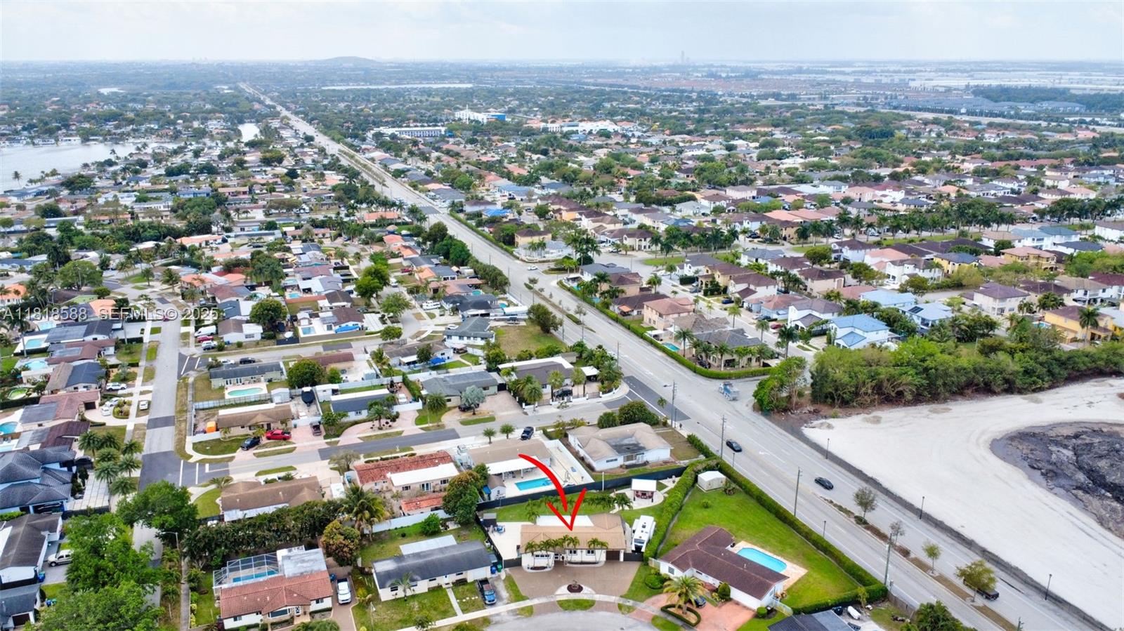 8540 Northwest 182nd Street Hialeah, FL 33015 - Photo 55 of 63 an aerial view of residential houses with outdoor space