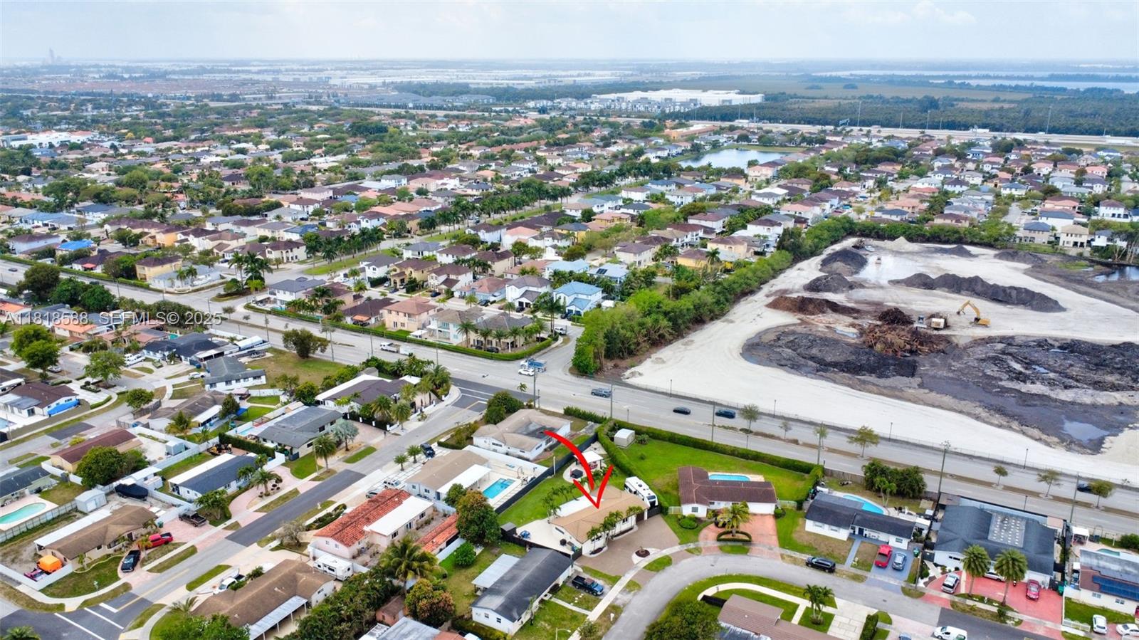 8540 Northwest 182nd Street Hialeah, FL 33015 - Photo 56 of 63 an aerial view of a city