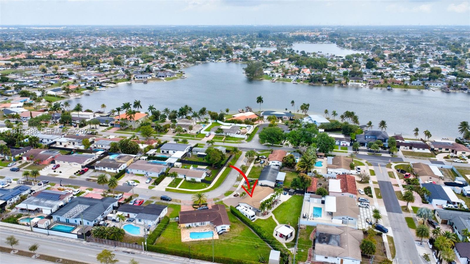 8540 Northwest 182nd Street Hialeah, FL 33015 - Photo 59 of 63 an aerial view of city and lake view