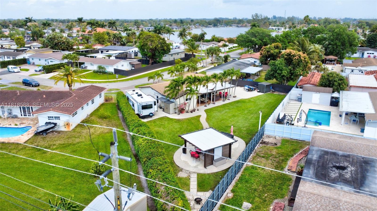 8540 Northwest 182nd Street Hialeah, FL 33015 - Photo 62 of 63 an aerial view of a chairs and table