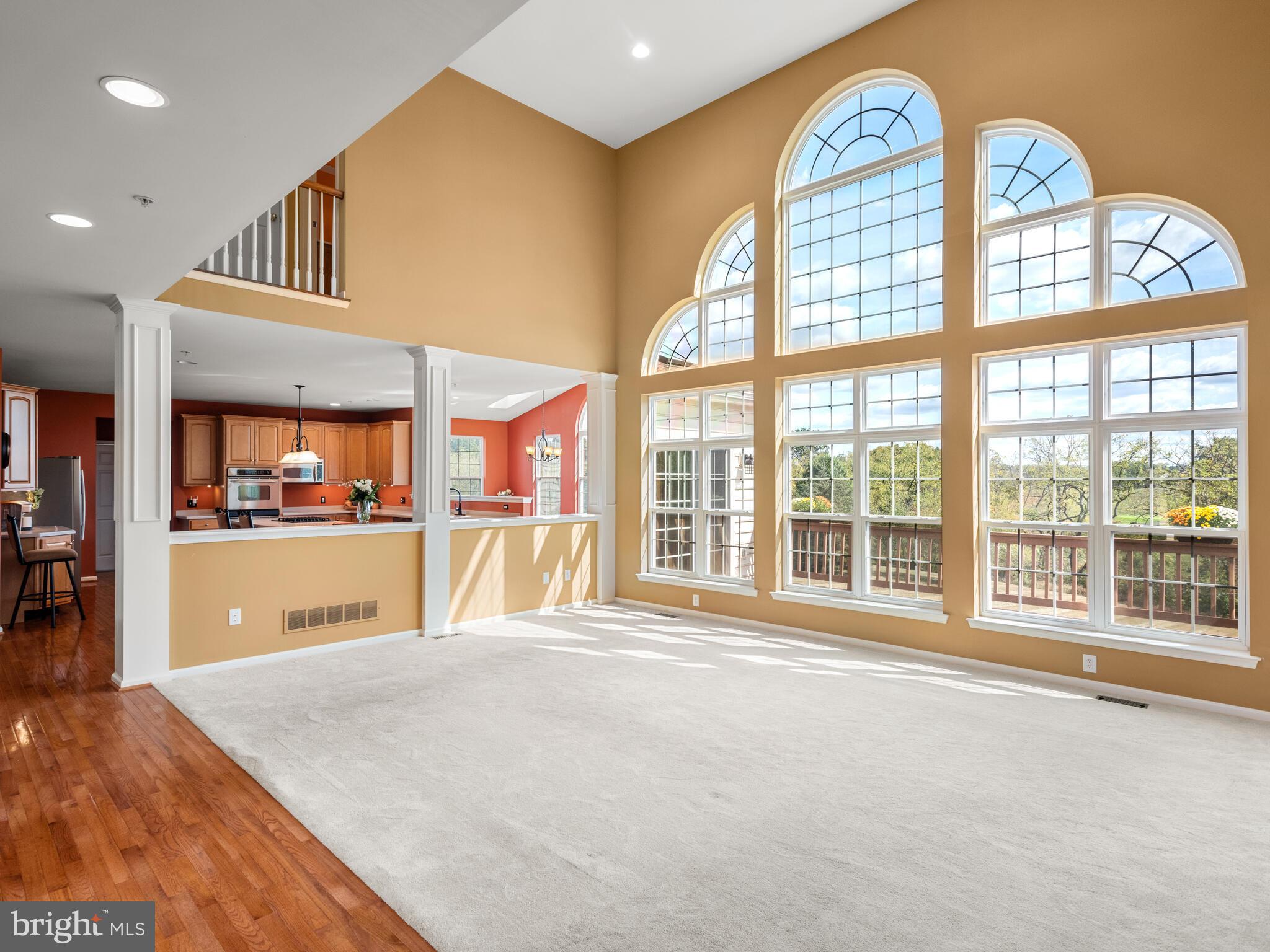 1180 Rupert Road Pottstown, PA 19464 - Photo 17 of 51 a view of an empty room with window and kitchen view