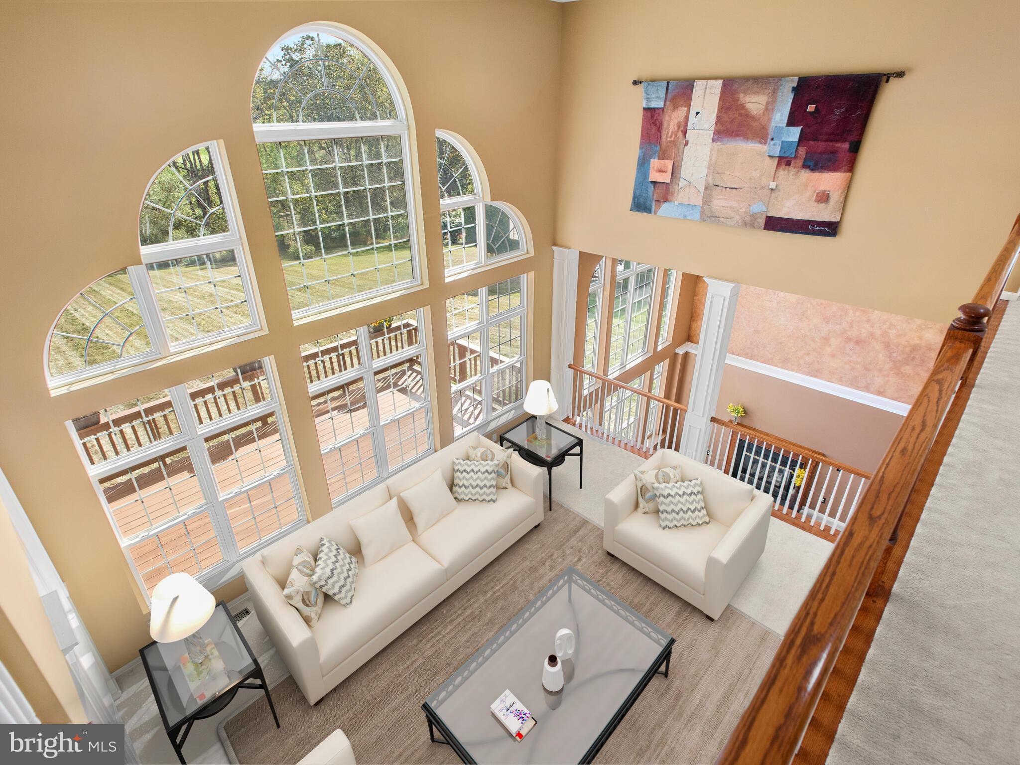 1180 Rupert Road Pottstown, PA 19464 - Photo 20 of 51 a living room with furniture and floor to ceiling windows