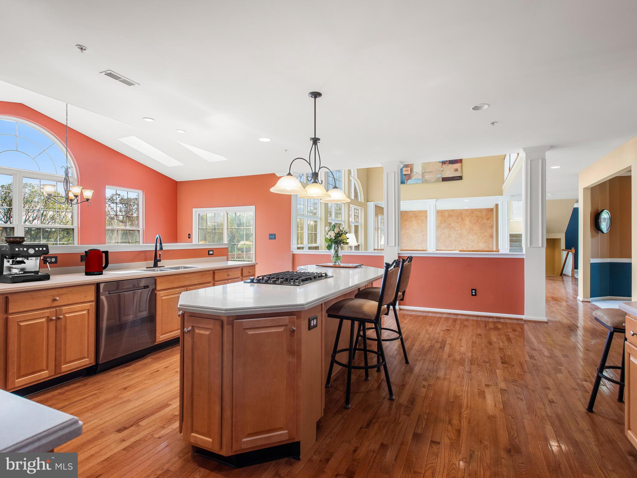 1180 Rupert Road Pottstown, PA 19464 - Photo 25 of 51 a kitchen with stainless steel appliances granite countertop wooden floors and table