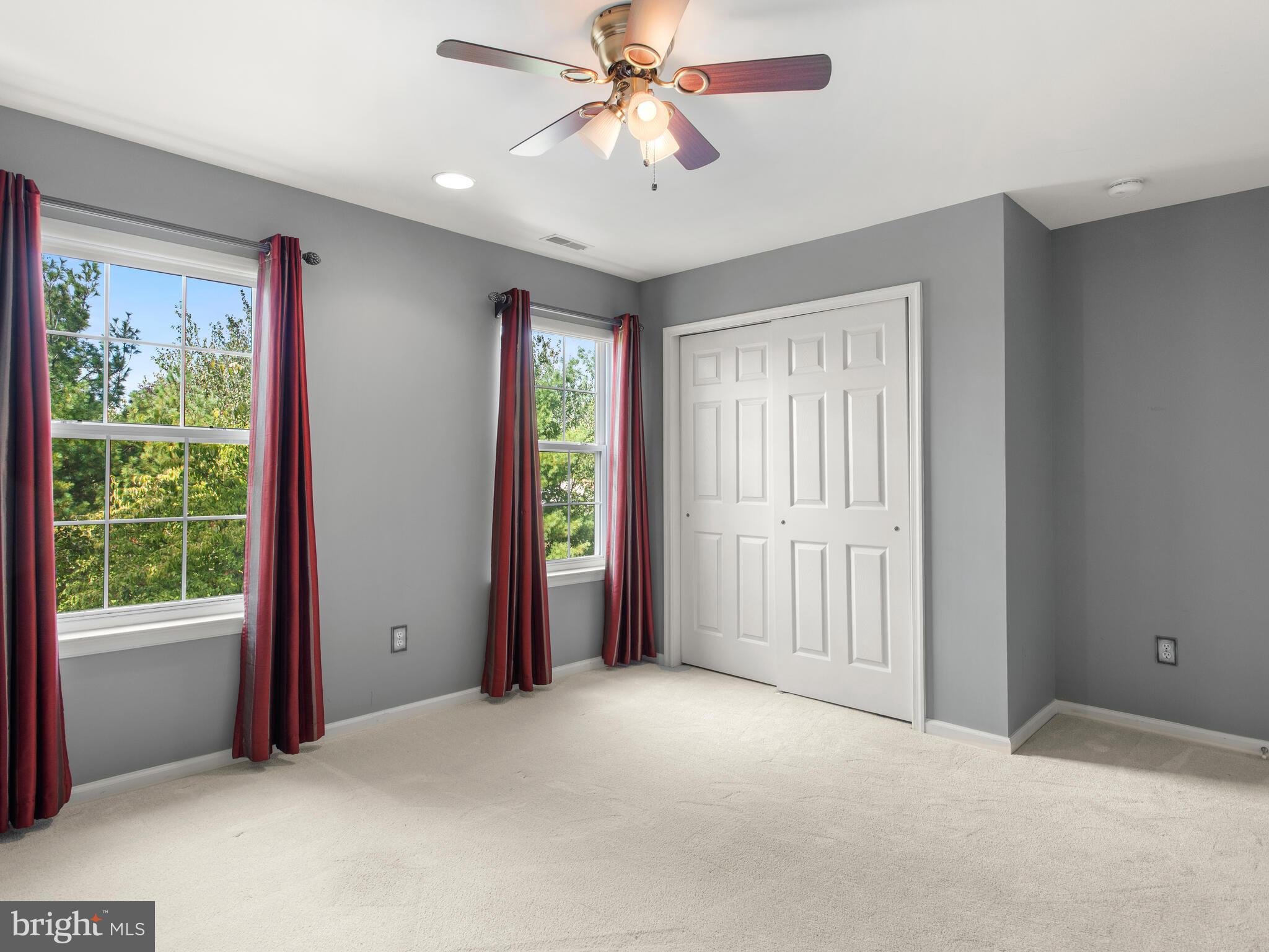 1180 Rupert Road Pottstown, PA 19464 - Photo 36 of 51 an empty room with windows and closet