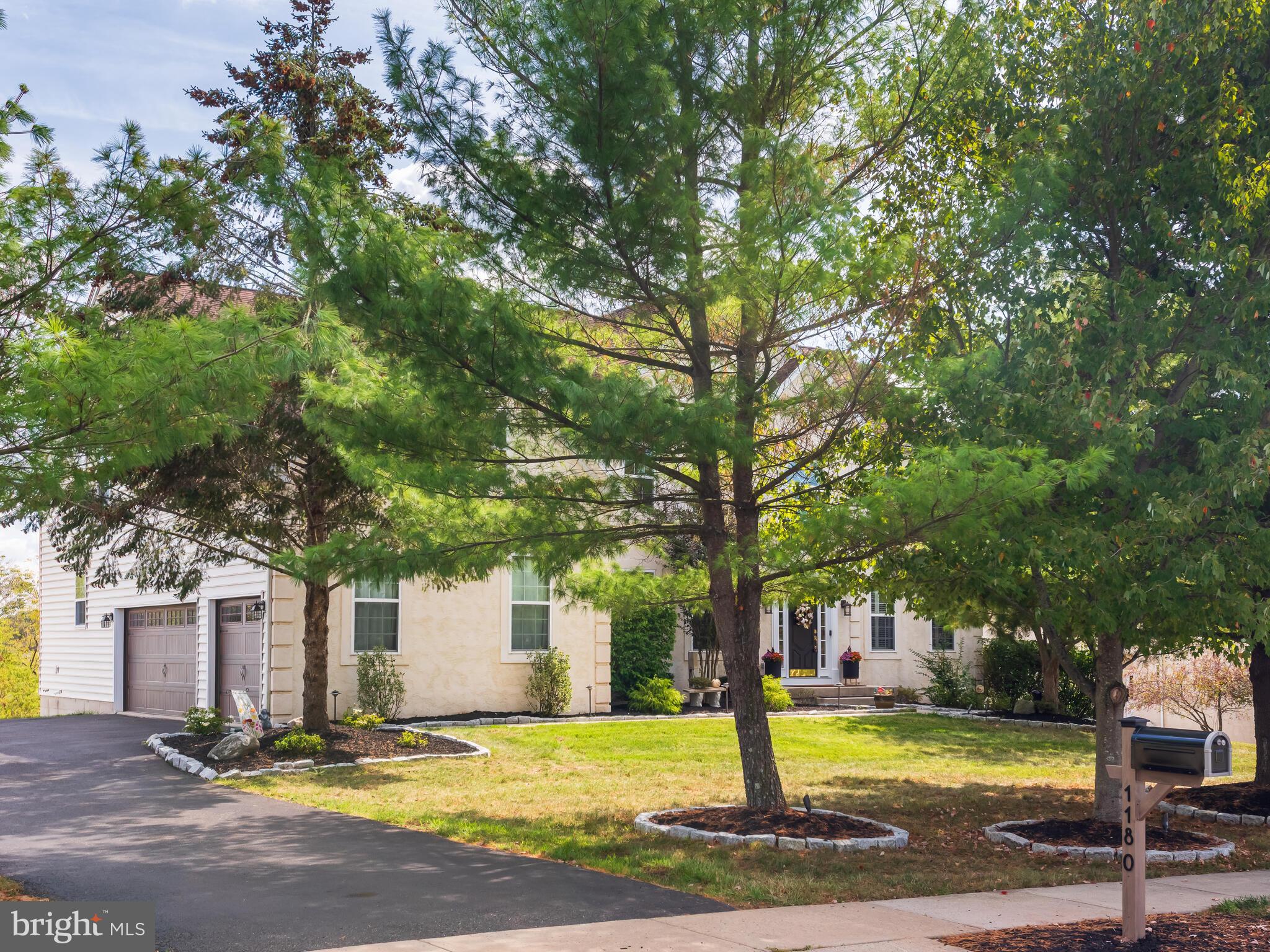 1180 Rupert Road Pottstown, PA 19464 - Photo 4 of 51 a view of a house with garden and trees
