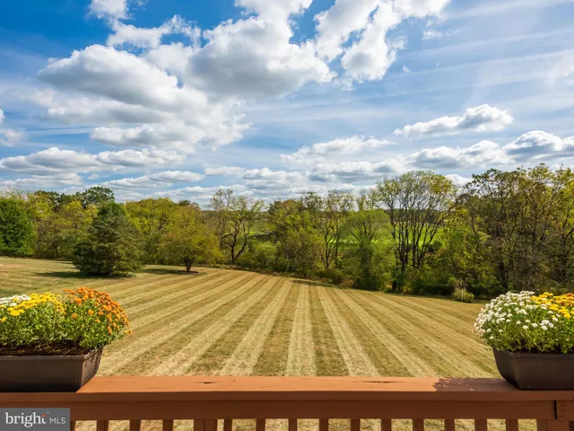 an aerial view of lake residential houses with outdoor space